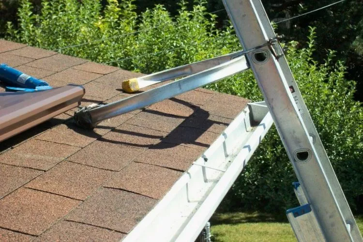 How do you not crush gutters with a ladder