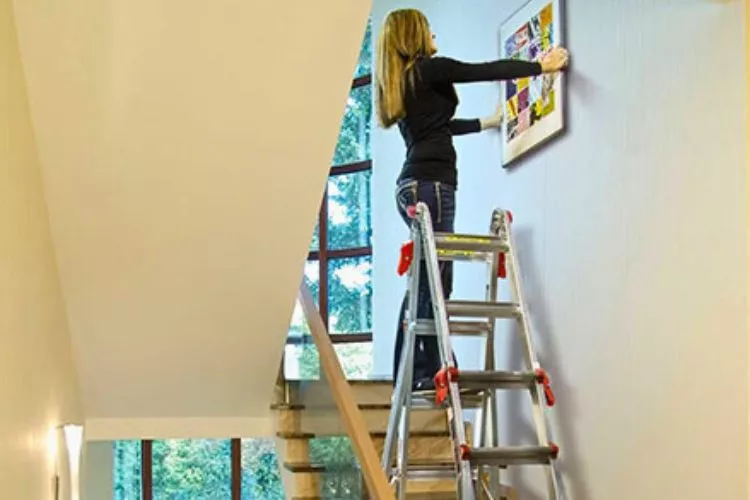 How to use a ladder on stairs to paint