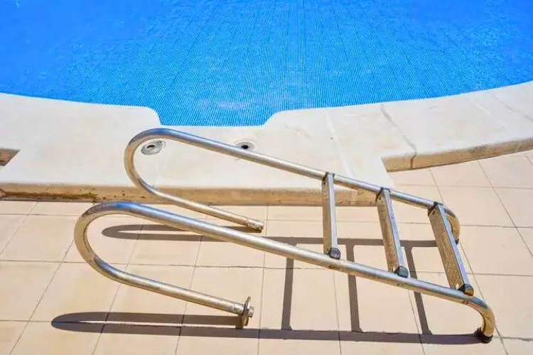 How to install a pool ladder in concrete