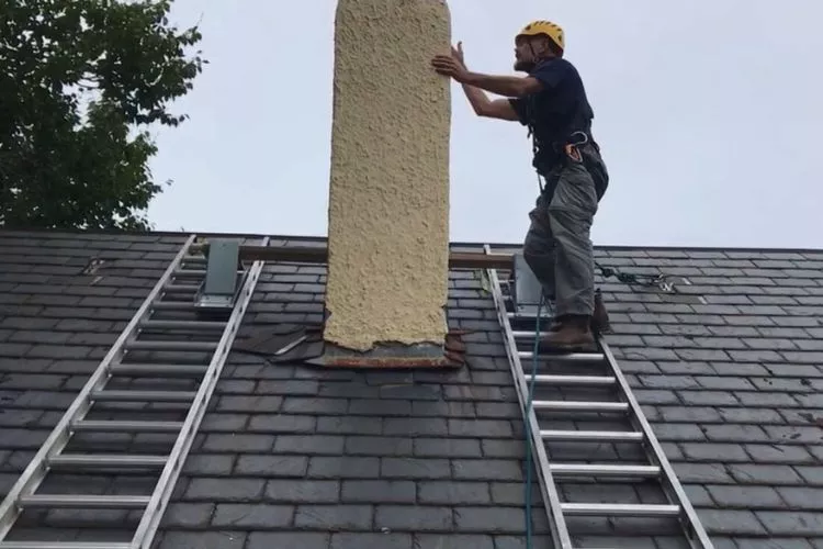 How to put a ladder on a sloped roof