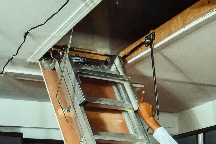 How to fix attic ladder spring