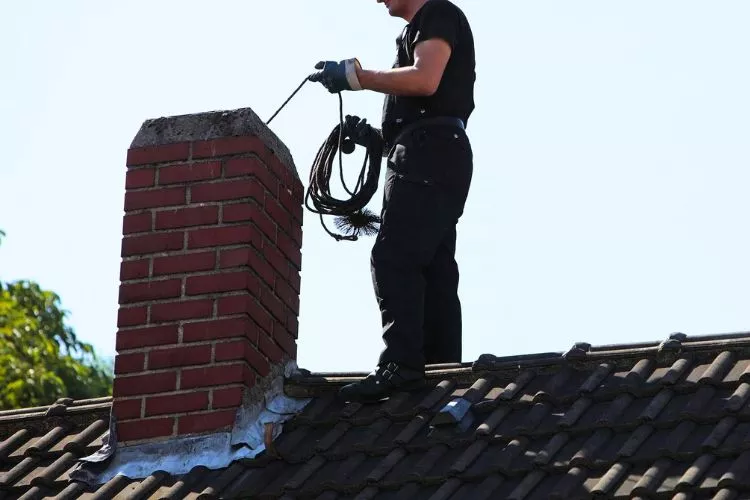 The Role of Weather Conditions in Roof and Chimney Maintenance